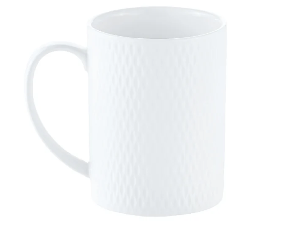 White ceramic coffee cup with diamond texture design