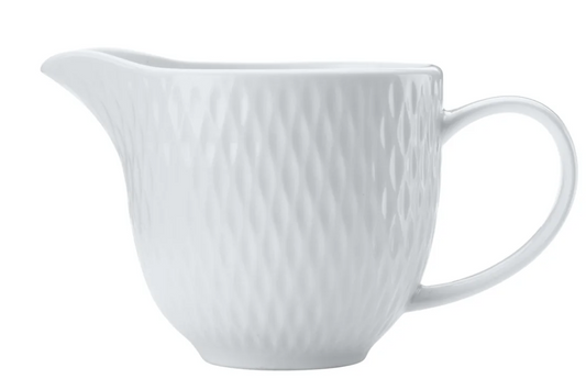 Stylish tabletop creamer jug for serving coffee milk and cream
