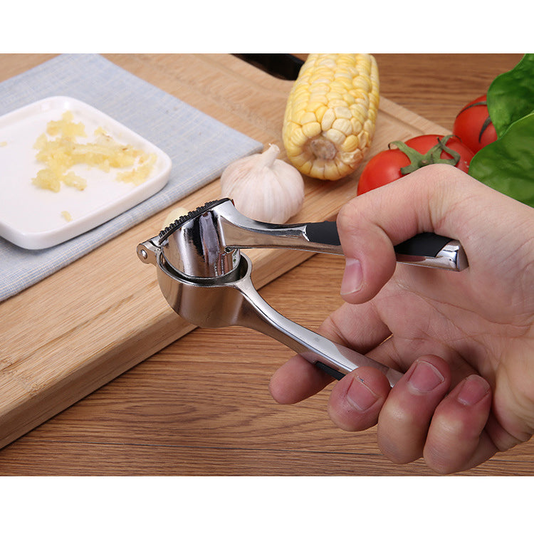 Self-Cleaning Garlic Press