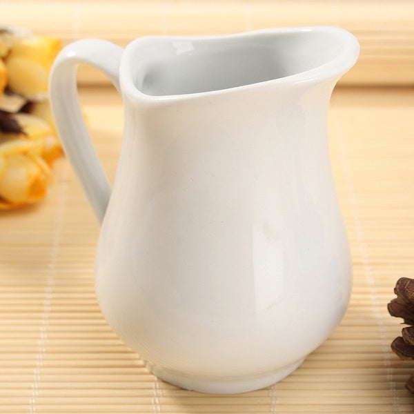 White Basics 110ml porcelain milk jug by Maxwell & Williams for serving milk and cream