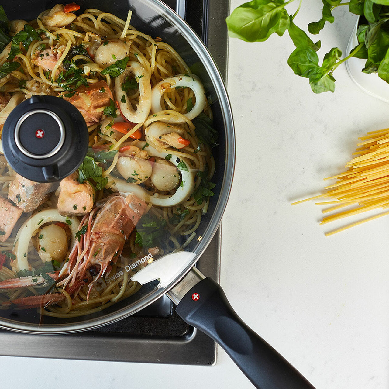 Swiss Diamond XD 28cm 4.2L saute pan in kitchen use for stir fry and sauté cooking